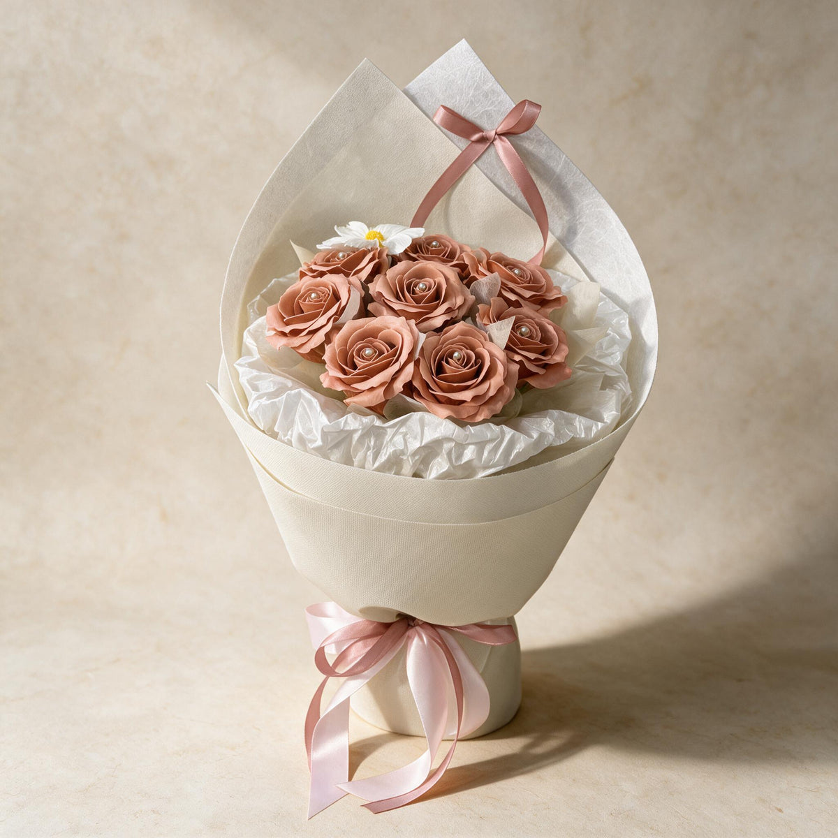 Always Yours soap flower bouquet of eight dusty pink roses and a cosmos in cream wrap