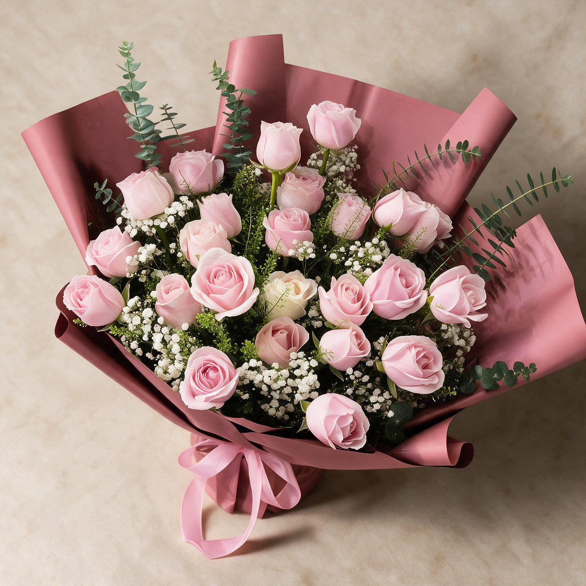 Top view of the Amour fresh flower bouquet of 24 pink roses with baby’s breath and eucalyptus