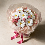 Top view of the Sweet Promise soap flower bouquet of seven white cosmos with pink baby’s breath