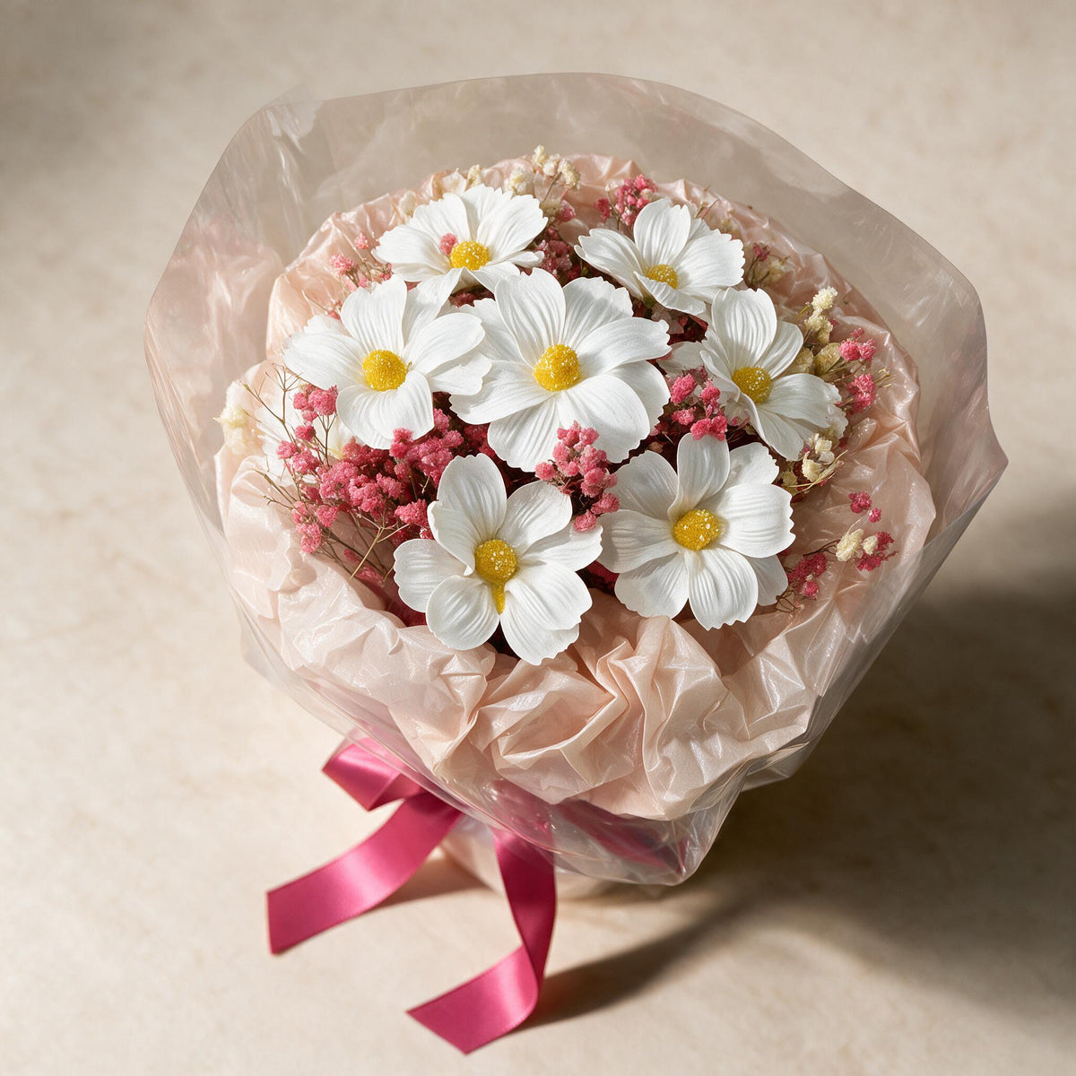 Top view of the Sweet Promise soap flower bouquet of seven white cosmos with pink baby’s breath