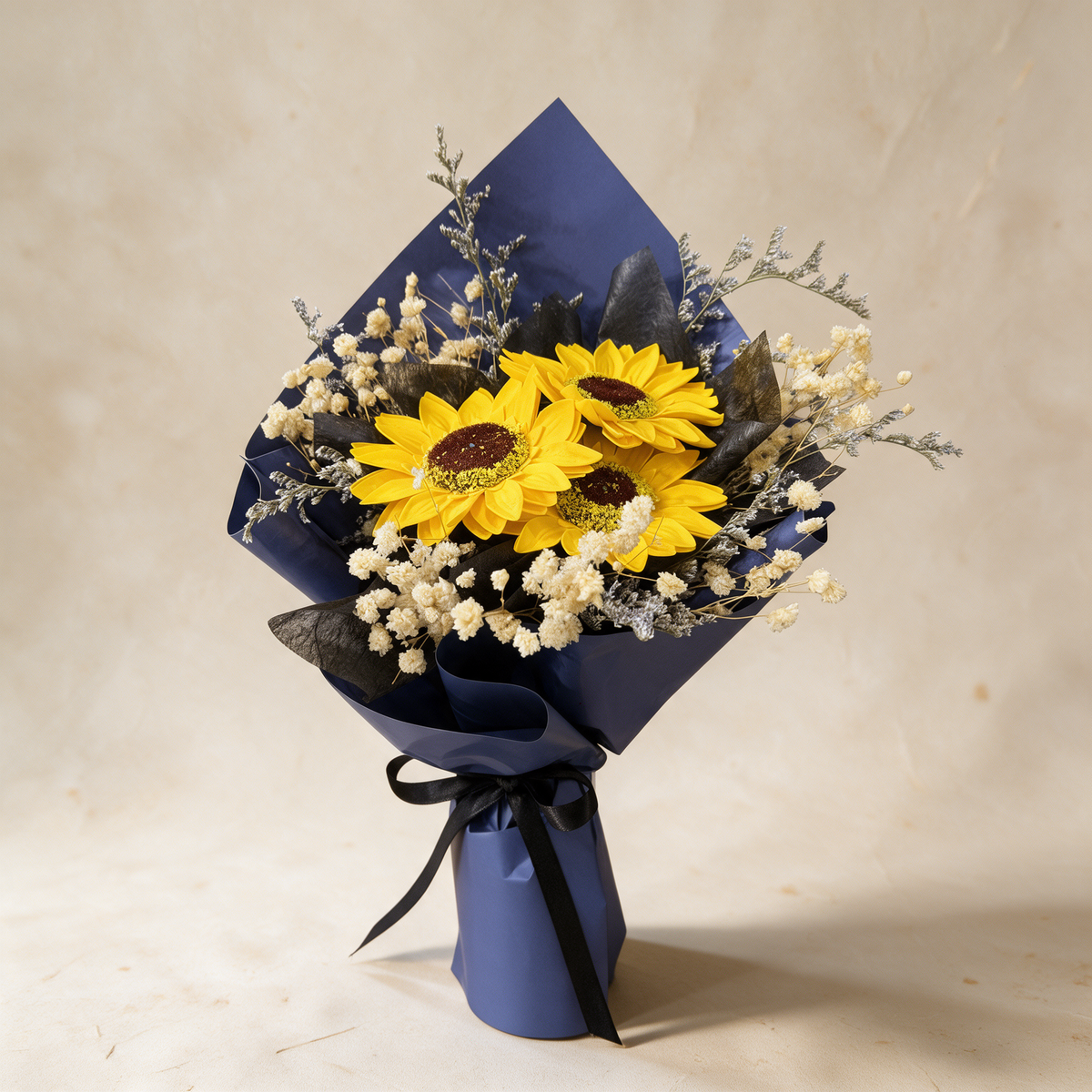 Glow soap flower bouquet of three sunflowers with baby’s breath and caspia in navy blue wrap