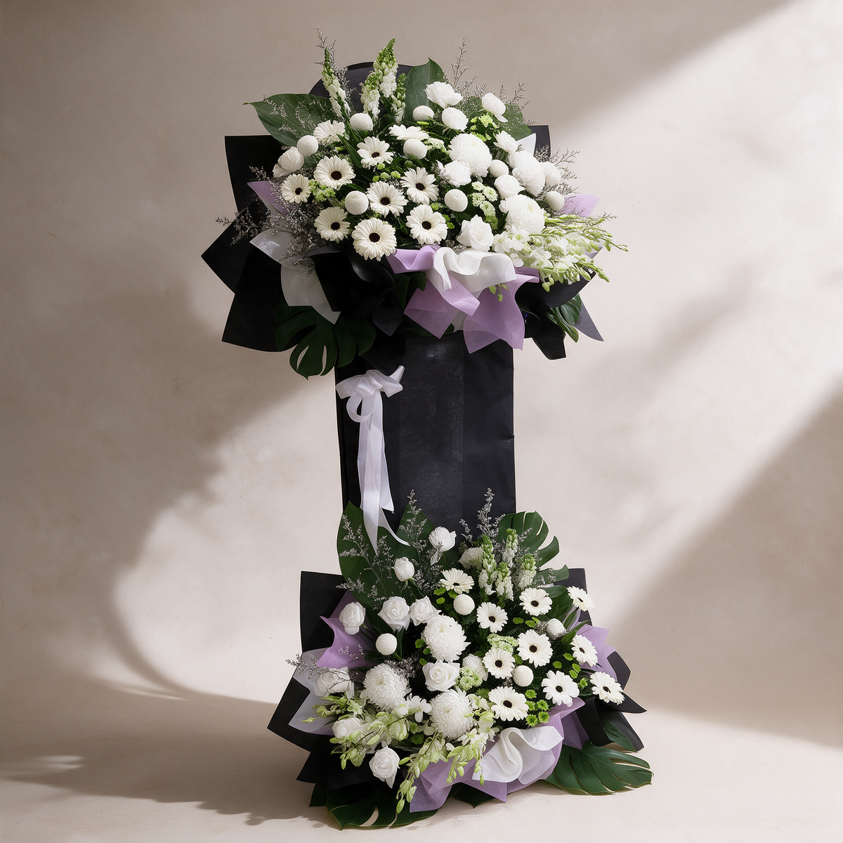 Side view of the Legacy white two-tier funeral flower stand