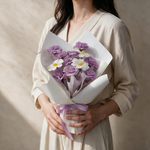 Woman holding the Lilac Wish soap flower bouquet