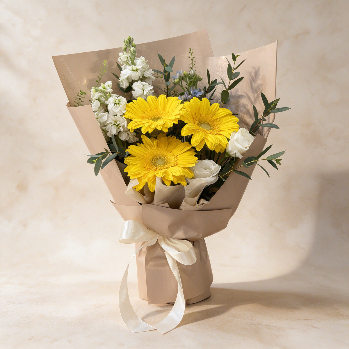 Next Chapter fresh flower bouquet of yellow gerbera daisies, matthiola and eustoma