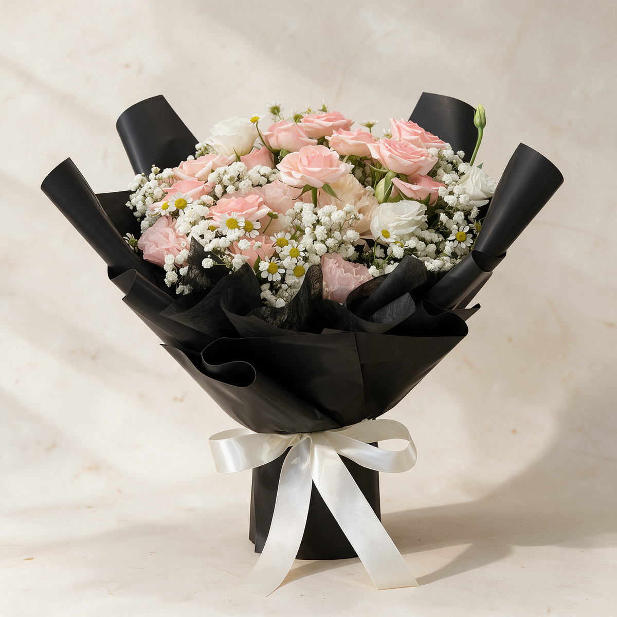 Precious fresh flower bouquet of blush pink roses with white eustoma, baby’s breath and mini daisies