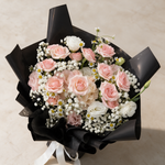 Top view of the Precious fresh flower bouquet of pink roses and baby’s breath