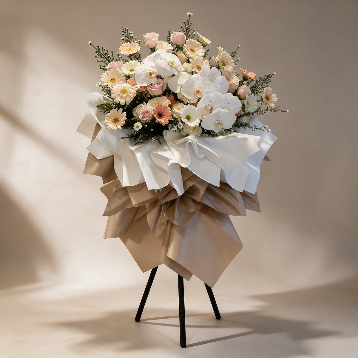 Prosperity grand opening flower stand of gerbera daisies, roses and white phalaenopsis orchids