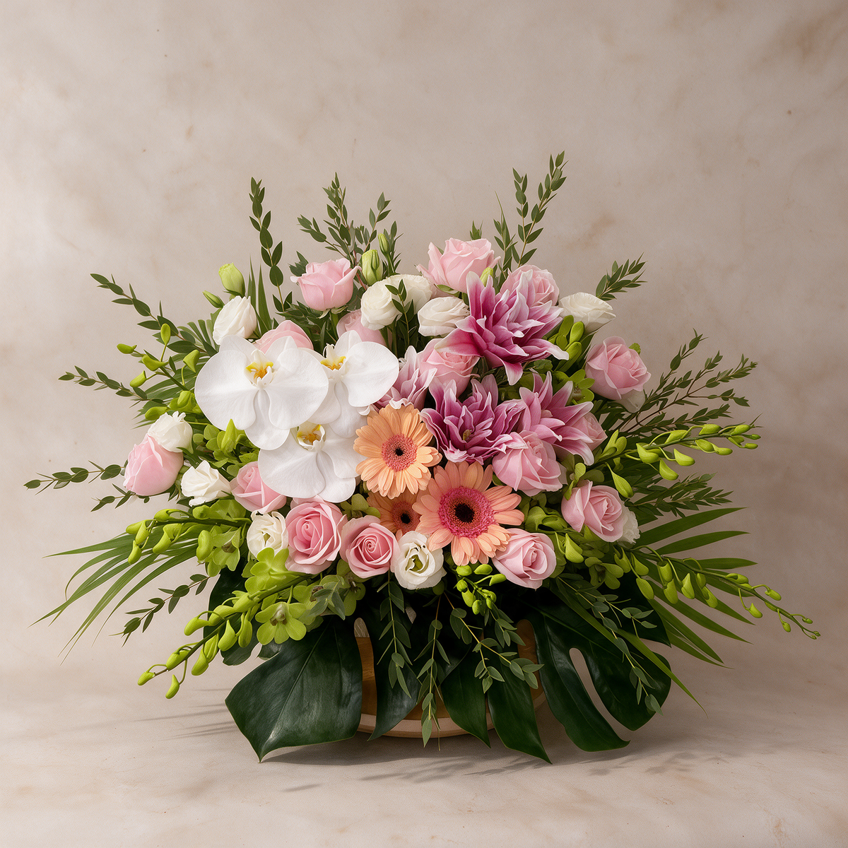 Radiance fresh flower basket of pink roses, lilies, peach gerberas and white phalaenopsis orchids