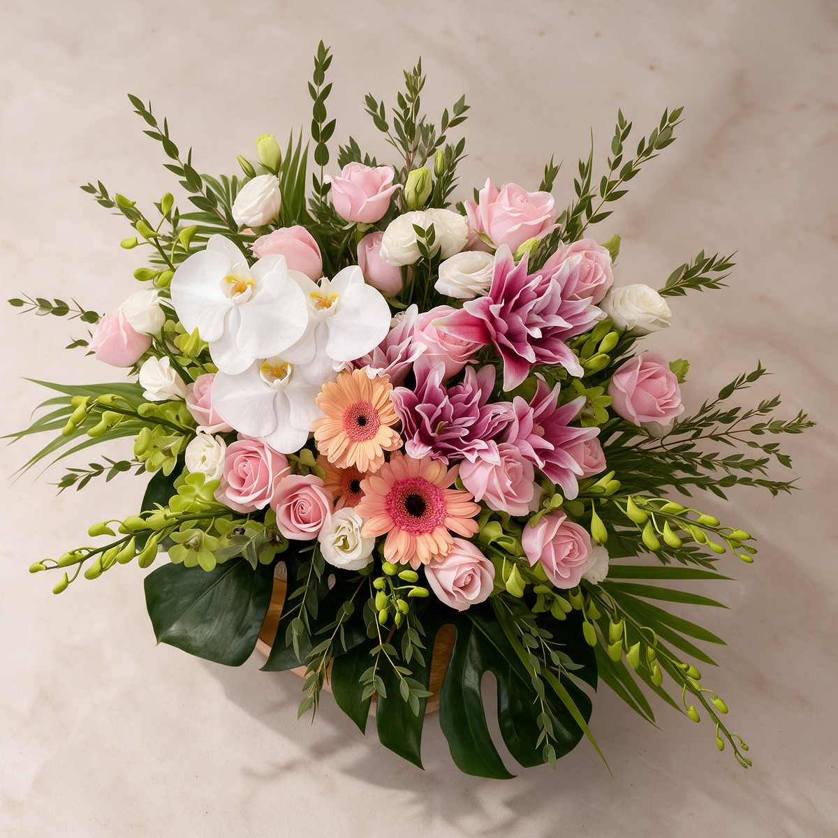 Top view of the Radiance fresh flower basket of roses, lilies and orchids