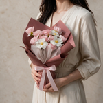 Woman holding the Rosie pink soap flower bouquet