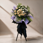 Serenity condolence flower stand of cream gerbera daisies and white ping pong chrysanthemums
