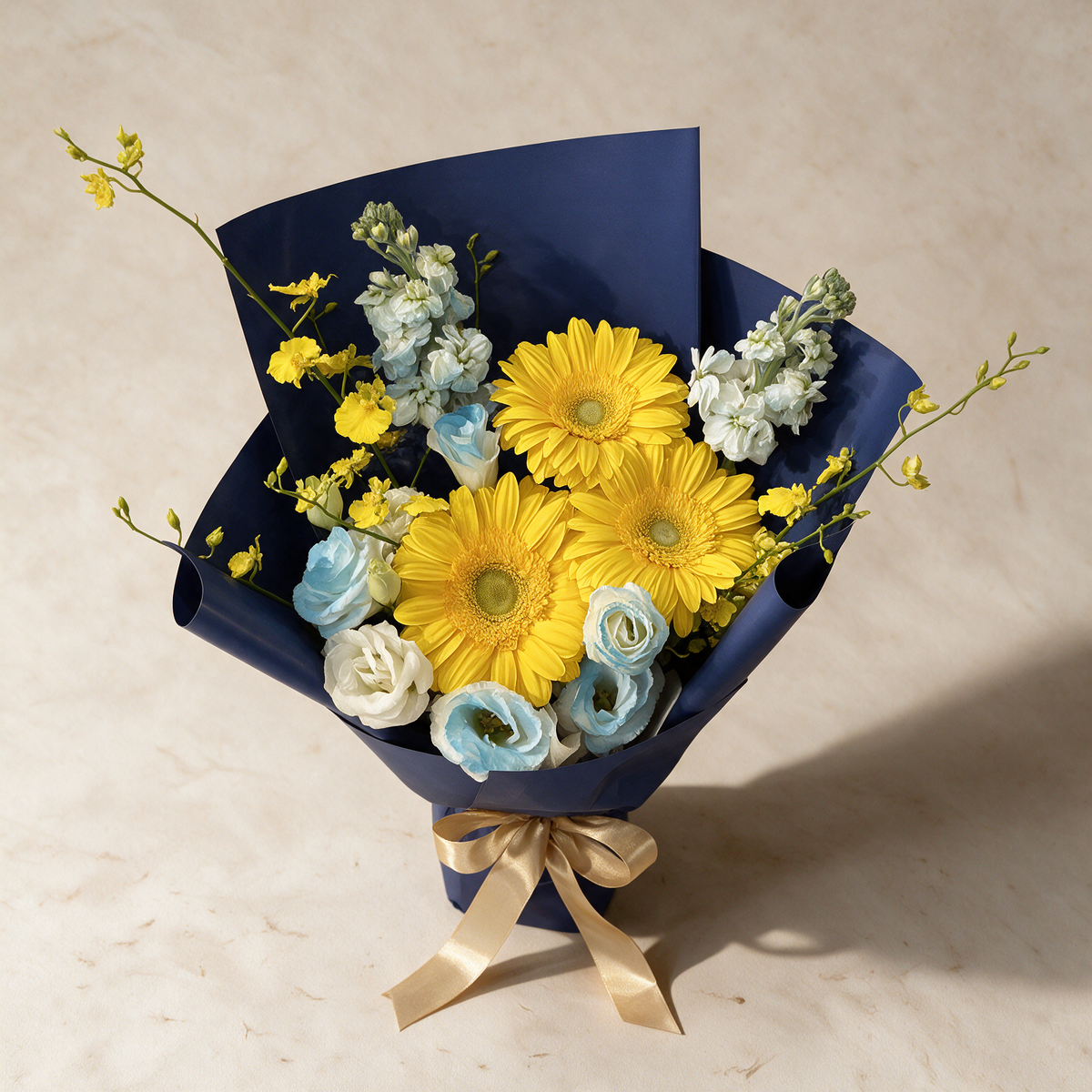 Top view of the Soar bouquet of yellow gerberas, eustoma and matthiola