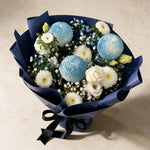 Top view of the Tender Love fresh flower bouquet of three blue pingpong chrysanthemums with asters, eustoma and baby’s breath